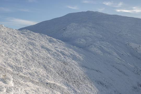 Mount Jefferson ridge under changing alpine weather in the Presidential Range