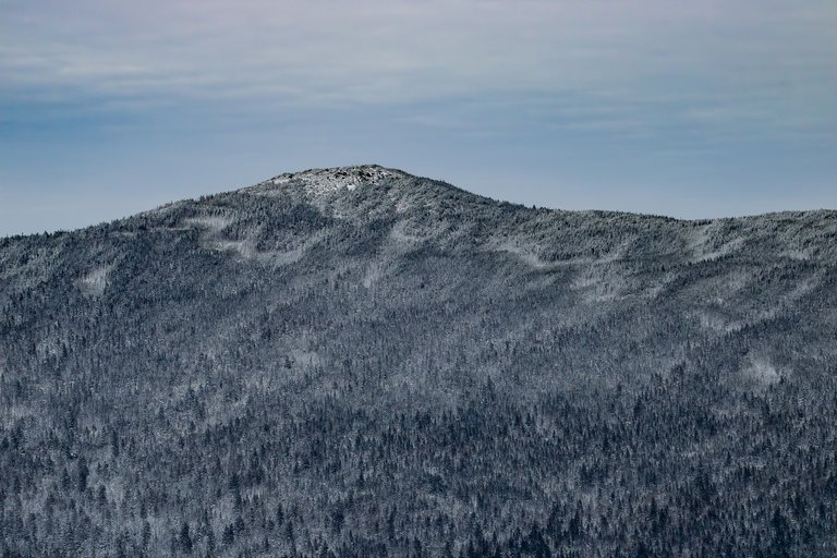 Mount Jackson snow-covered summit and frosted forest in White Mountains winter