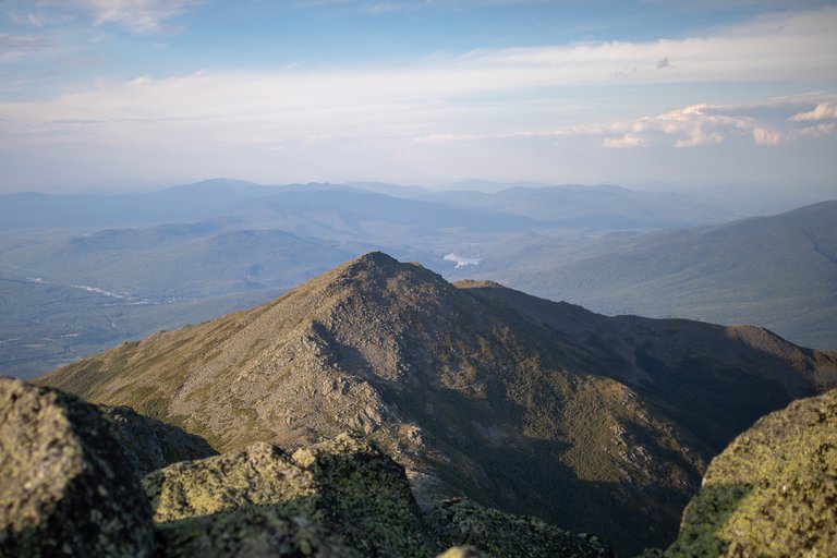 Mount Madison ridge illuminated by golden sunset in White Mountains, New Hampshire