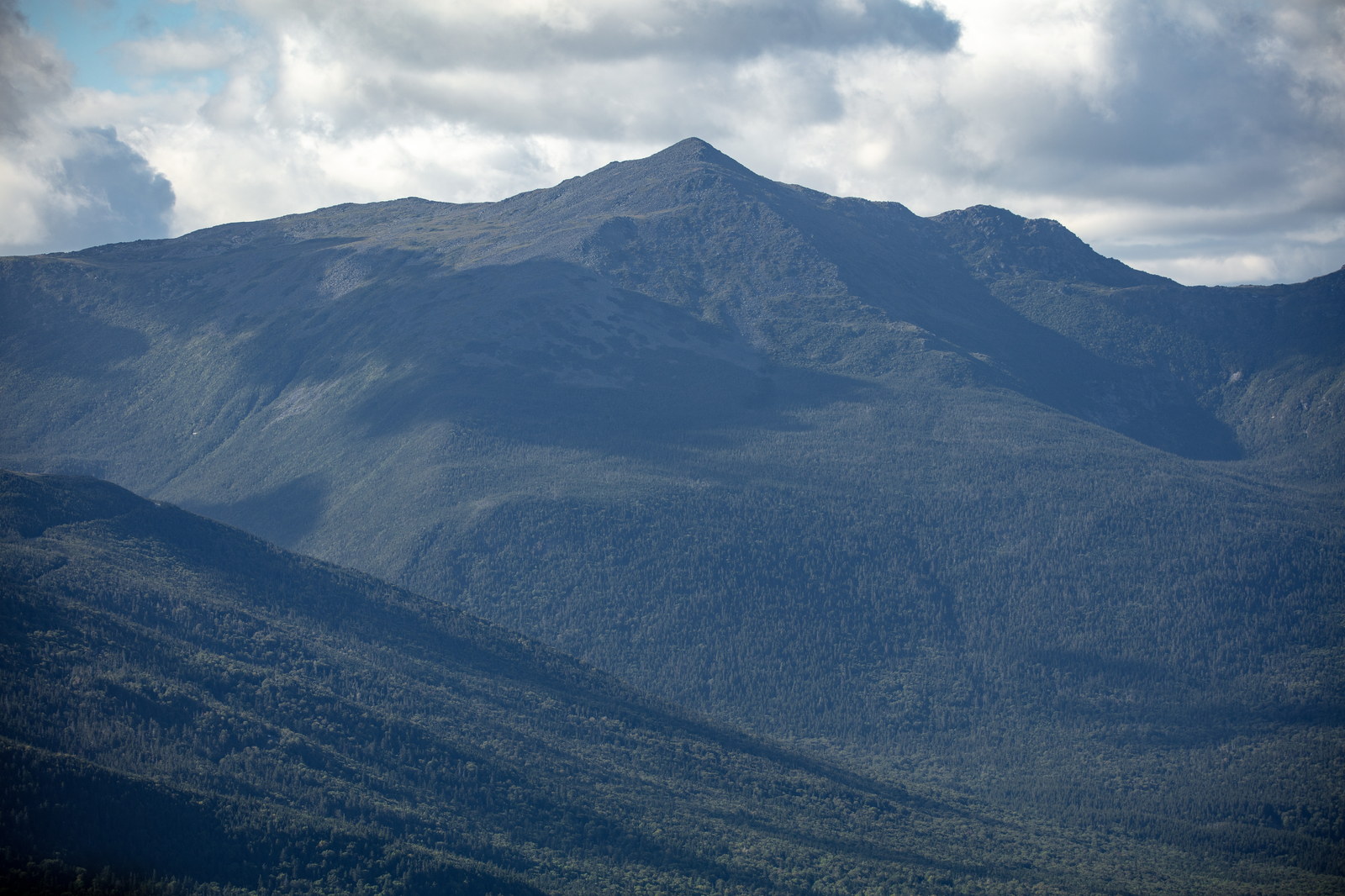 Mount Adams summit with afternoon light and cloud shadows in White Mountains