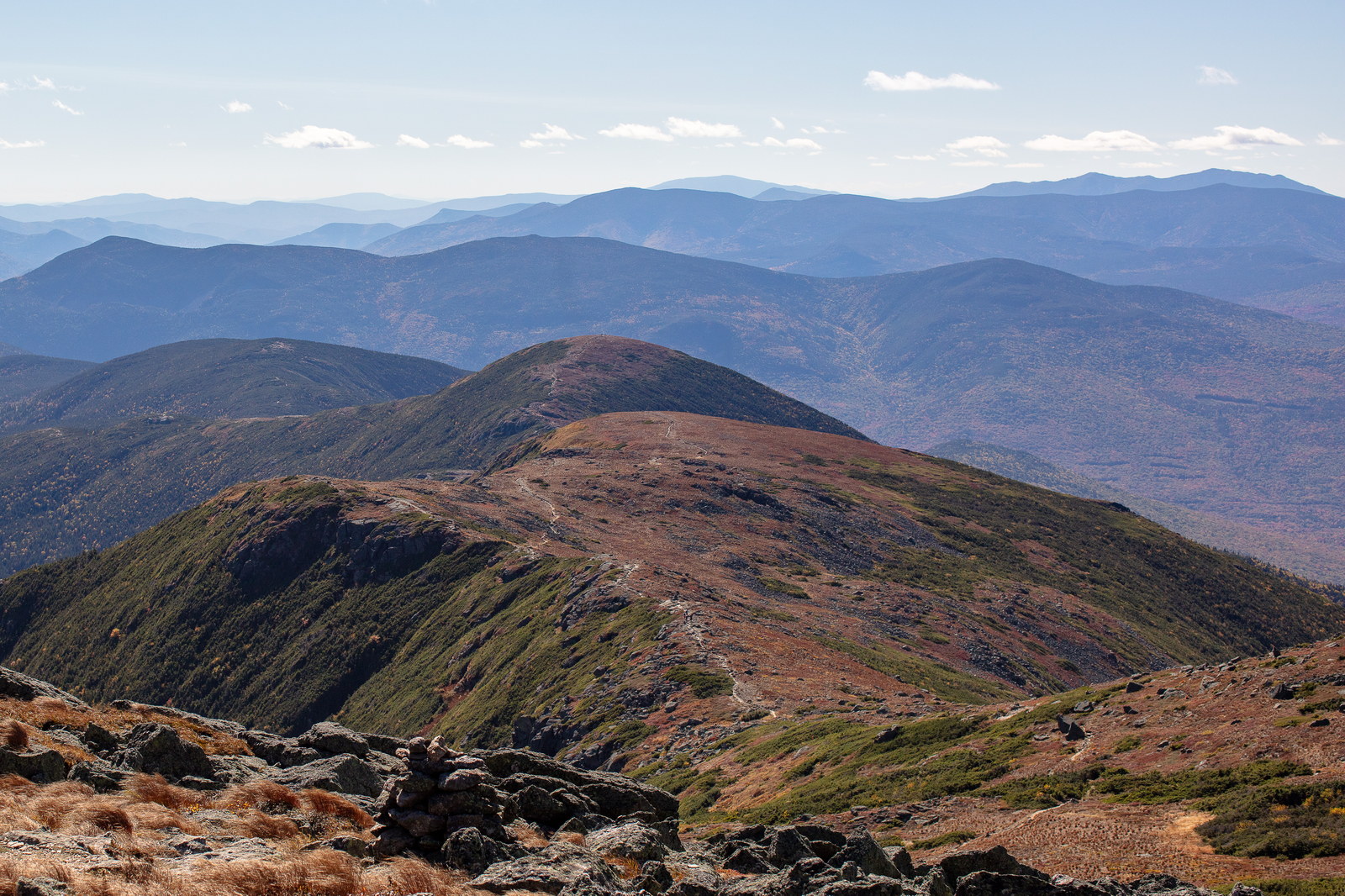 Mount Eisenhower ridge and rocky trail in autumn under clear sky