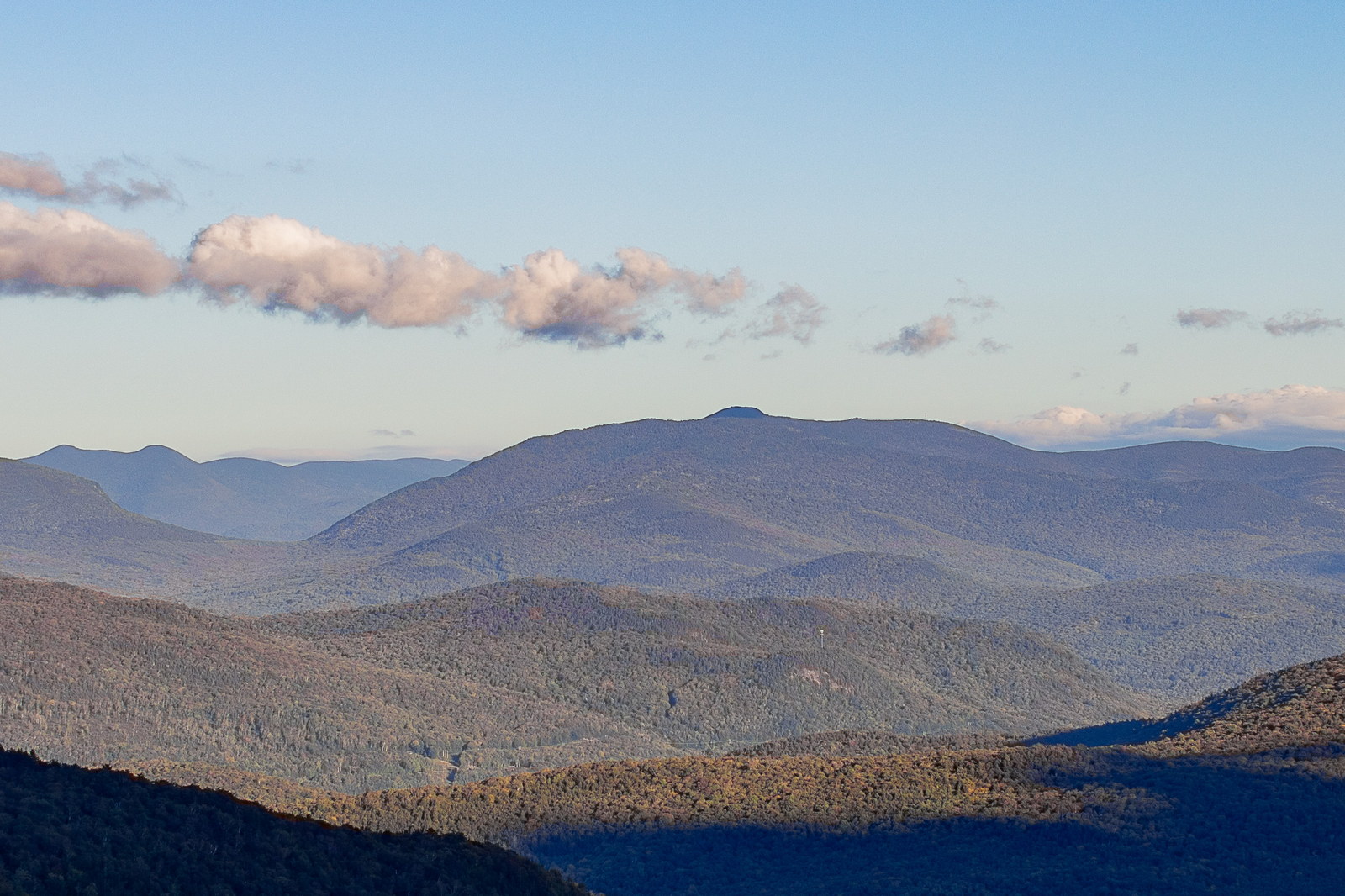 Mount Tecumseh ridge line under clear sky in fall afternoon, White Mountains New Hampshire