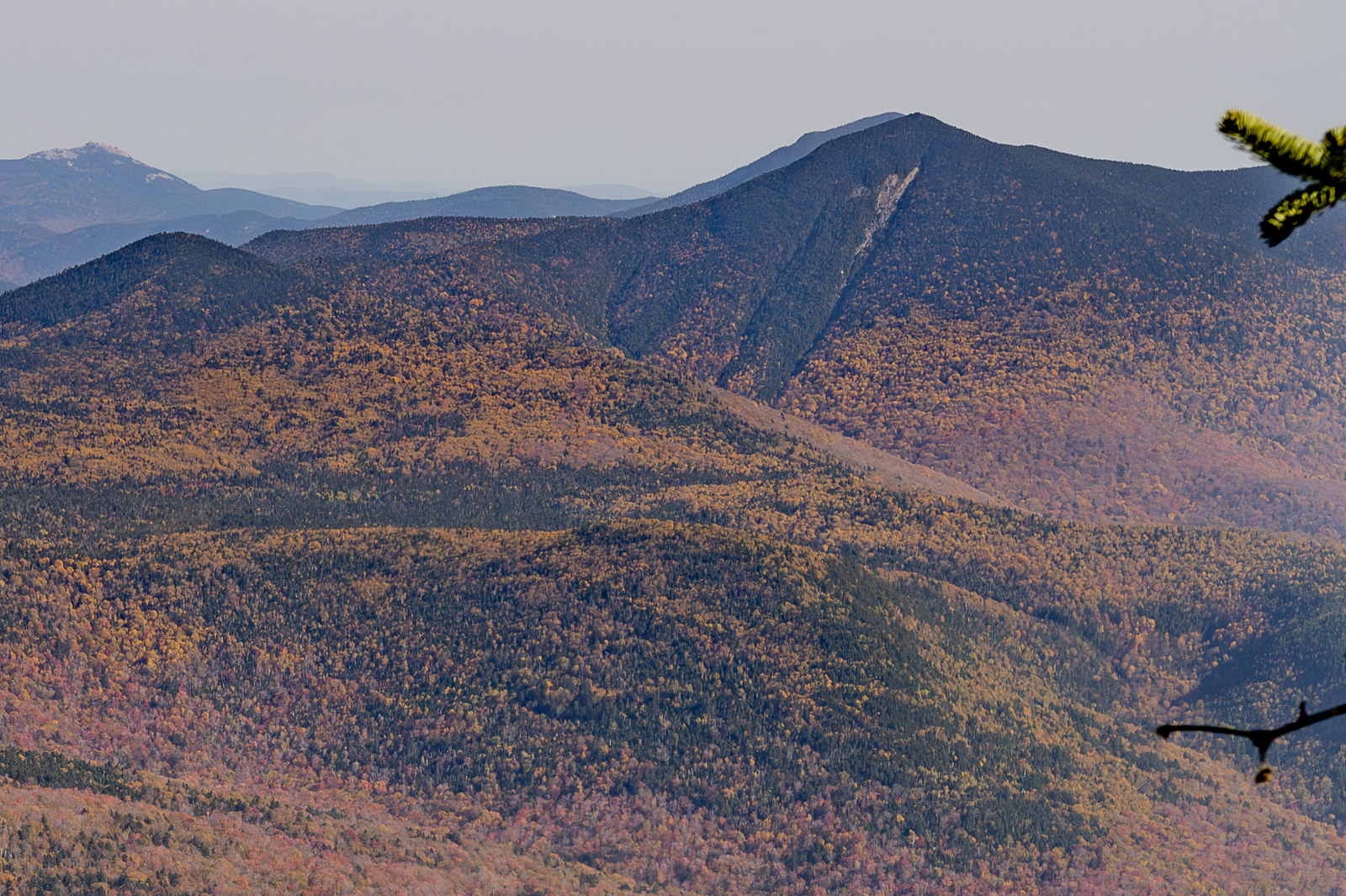North Tripyramid mountain with colorful fall forest in White Mountains, New Hampshire