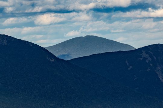 Mount Carrigain summit profile above surrounding ridgelines in New Hampshire