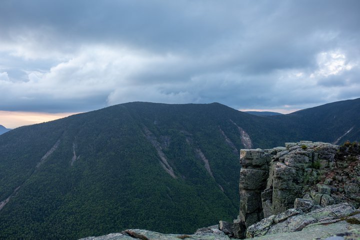 West Bond summit rocks overlooking Zealand Valley and Bondcliff